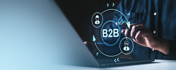 Poster - business-to-business b2b digital communication concept with icons and businessman hand interacting w