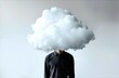© Truprint - Man with a cloud for a head standing against a grey background in an artistic expression of thought and imagination