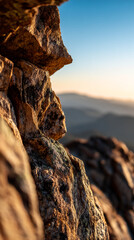 Aufkleber - Close-up of rough rock texture, illuminated by sunlight, showing natural patterns and colors, suggesting strength, resilience, and the beauty of nature.