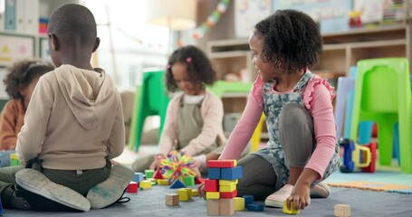 Poster - Girl, student and play with blocks in classroom for learning, problem solving and creative activity. Child, kids and building stack of education game, puzzle solution and motor growth in kindergarden