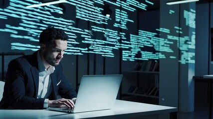 Aufkleber - Focused programmer working late at night in a dark office, illuminated by the glow of his laptop screen and the projected code displayed on the glass wall