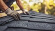 © ArpPSIqee - Roofing contractor installing shingles on a new home roof. Featuring expertise and construction techniques