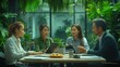 © Birul - Business Team Collaborating in a Green Office Environment