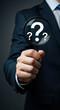 © StockWorld - Unveiling Answers: Man with Magnifying Glass & Questions - Mystery, Research, Inquiry, Solution, Doubt, Investigation, Business Concept