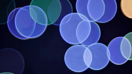 Poster - Colorful bokeh spheres gently floating against dark background, creating mesmerizing dreamlike abstract visual with vibrant gradient and soft glowing effect