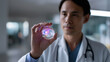 © Debi Kurnia Putra - Future of medicine doctor examines virtual brain function cognition mental health visualization