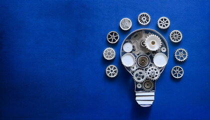 Poster - Light bulb composed of gears on a blue background