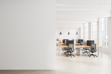 Fototapete - Minimalist office interior with blank wall for poster mockup and bright open workspace with modern furniture and large windows for natural light. 3D Rendering