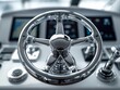 © imagemir - A sleek, polished chrome ship's steering wheel with modern technological displays in the background, indicating a luxury boating experience.