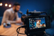 © standret - Camera is filming him. Man is on the radio doing podcast live