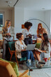 © bernardbodo - Businesswomen having a work meeting in cafeteria