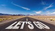 © Luisa - A view of a lonely desert highway with the inviting words 'Let's Go'. A perfect start for an adventurous journey in a vast open area.