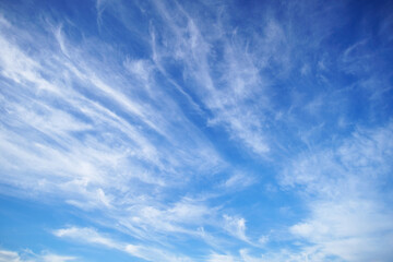 Wall Mural - beautiful blue sky with soft white clouds for abstract background