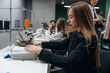 © standret - Job of clothing production. People are working by the sewing machines indoors