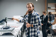 © standret - Job of clothing production. People are working by the sewing machines indoors