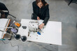 © standret - Seamstress is working indoors