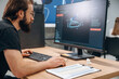© standret - Computer with 3d printer. Man is in the modern office, one person