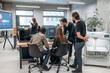 © standret - Working on a project together. Designer team are in the office