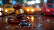 © Mariia - Legal gavel resting on wooden desk with blurred vehicles in background during evening