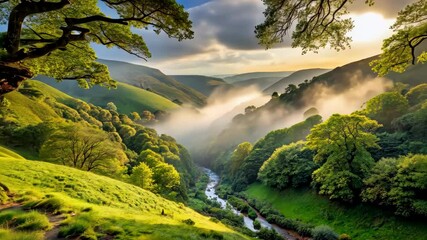 Poster - Sunrise over a misty valley with a winding river and lush green trees
