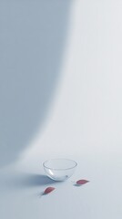 Poster - Empty glass bowl with red leaves on minimalist blue background