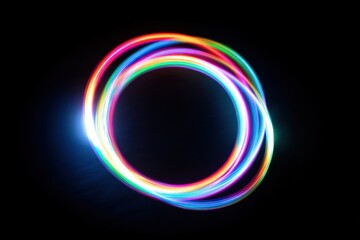 Poster - a mesmerizing circle of vibrant neon light trails dancing against a stark black background, creating