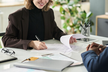 Poster - Manager signing financial document at meeting with businessman