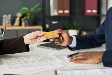 Poster - Businesswoman getting credit card at meeting with manager