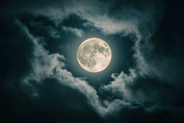 Naklejka na meble Full moon surrounded by dark clouds in the night sky.