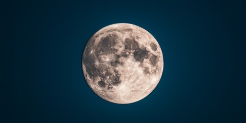 full moon on deep blue sky