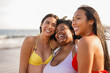 © Sabrina - Group of young multiracial women having fun during summer vacation on the beach - Diverse female friends hugging each other outdoor - Focus on african woman face