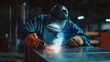 © Soulc - Welding technician wearing protective gear and welding metal parts. Featuring focus and safety