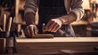 © Soulc - Carpenter building a wooden cabinet at a construction site. Featuring craftsmanship and precision
