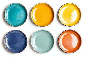 Poster - Aerial view of six colorful ceramic plates arranged on a white surface in a symmetrical pattern