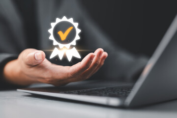 Poster - An icon in the hands of a businessman, a customer trust concept that influences marketing and strategic planning to build reputation and trust, which represents product standards and quality.