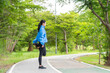 © tonjung - Beautiful Sport woman in sportswear running in the park. Healthy lifestyle and sport concept