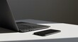 © Cintia - Laptop and phone on white desk in sunlight - workspace, technology, minimalist setup, personal electronics, desktop
