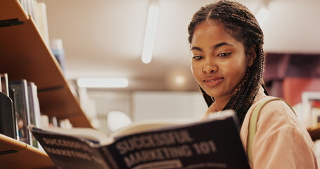 Poster - Black woman, reading and book as student in library for research, study marketing and career preparation. Person, textbook and information on business knowledge, education exam and university project