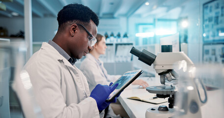 Poster - Biology, man or scientist on tablet to study in lab for medical research, discovery or genes innovation, Microscope, science or biologist with pharmaceutical report or futuristic genetic development