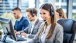 © Danial.Mehedi - A smiling businesswoman with a headset works as a call center operator providing customer service