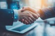 © AlAfiq - Professional handshake symbolizing partnership, collaboration, business agreement with digital technology overlay and modern workplace ambiance