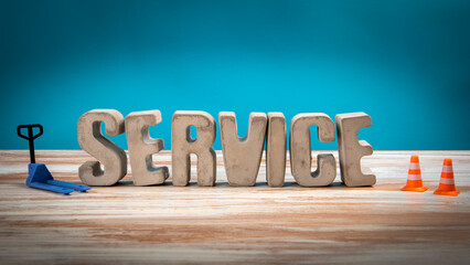 Wall Mural - Service Concept. Concrete alphabet letters on a light painted wood texture background