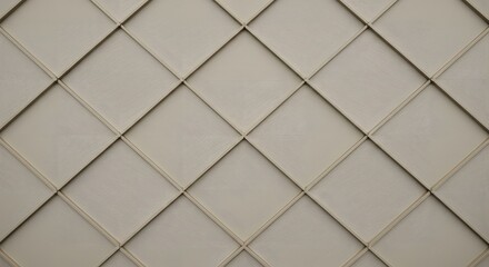 Concrete wall texture shows a seamless, geometric pattern of square blocks, a material often found in building construction