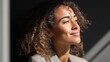 © WS Studio 1985 - Young Mixed Race Businesswoman Smiling Gently in Natural Light