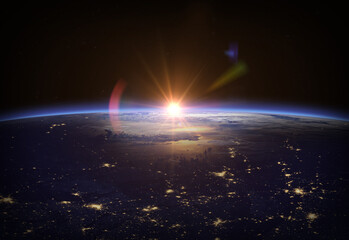Wall Mural - earth from space. sunrise. earth at the night. city lights on planet earth. human civilization conce