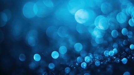 Poster - A mesmerizing abstract background featuring soft blue bokeh effects that create a serene and calming atmosphere.