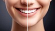 © watcharee - A close-up of a smiling woman, showcasing the contrast between two sides of her mouth, emphasizing dental aesthetics and smile enhancement.