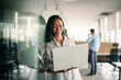 © NDABCREATIVITY - Professional business woman, female programmer thinking on online investment or software development