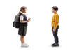 © Ljupco Smokovski - Girl in a school uniform carrying a backpack and talking to a boy