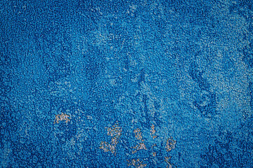Fototapete - Textured blue surface displays intricate patterns and varying shades, creating an eye-catching visual appeal